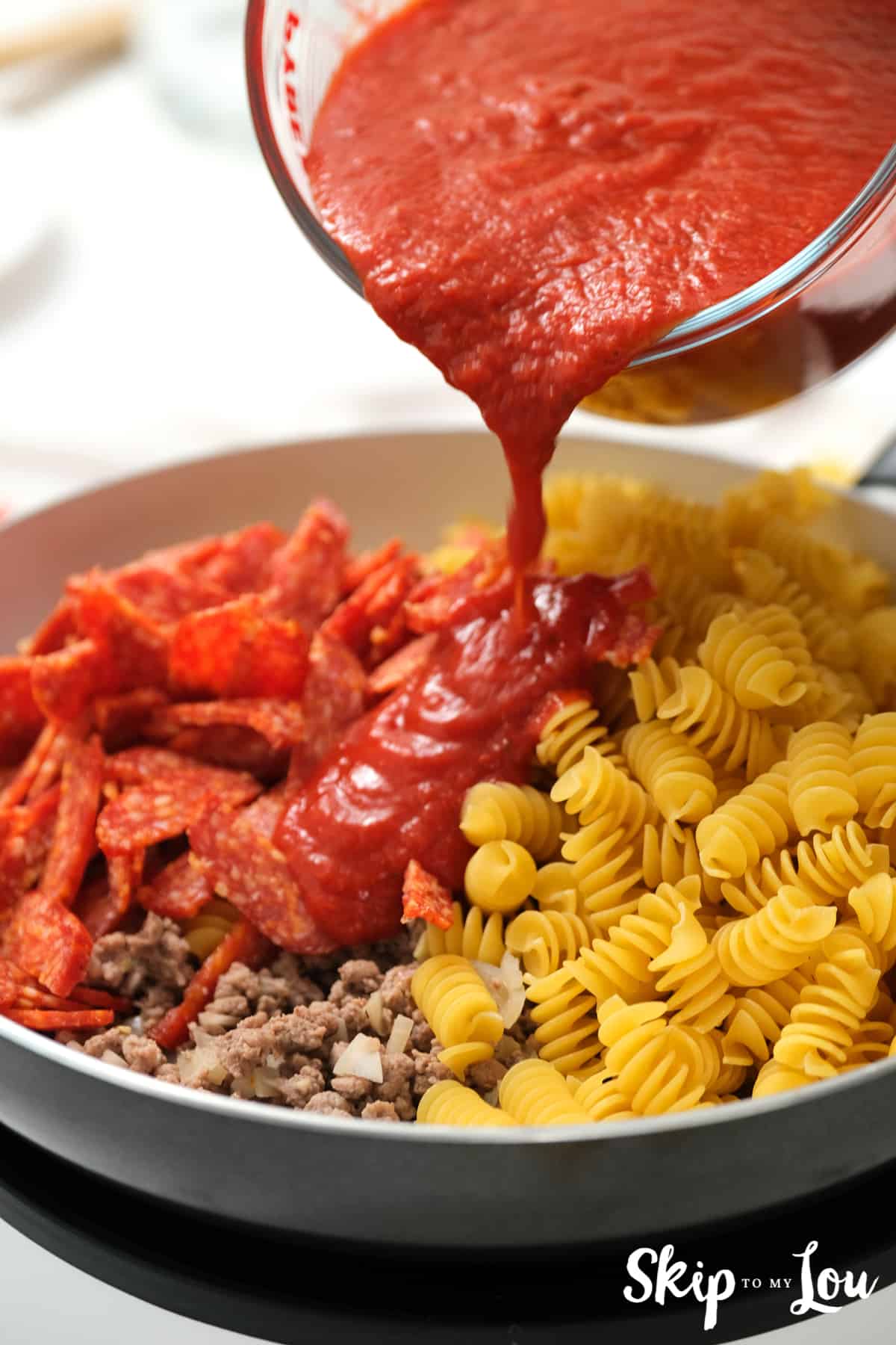 Meat. pasta, and sauce combined in skillet for the One Pot Pizza Pasta