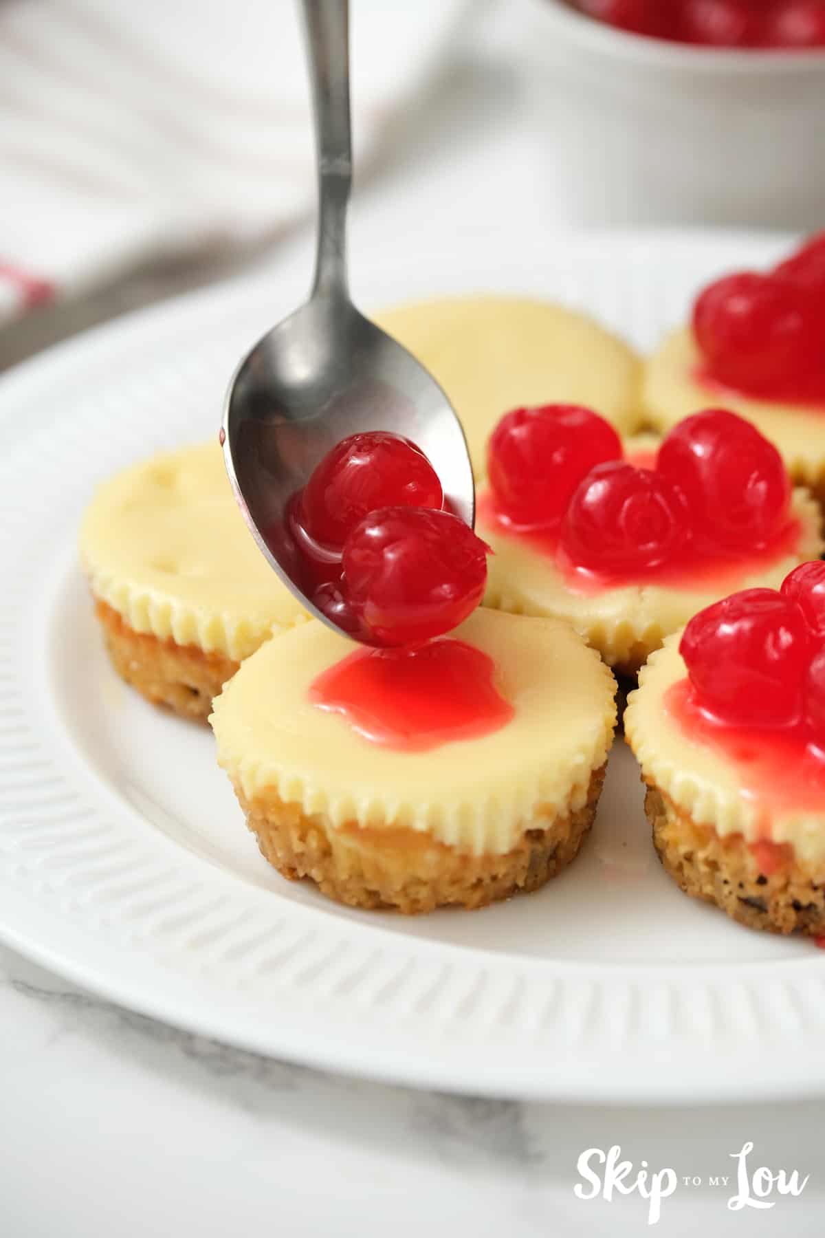 add cherry pie filling to top of cheesecake