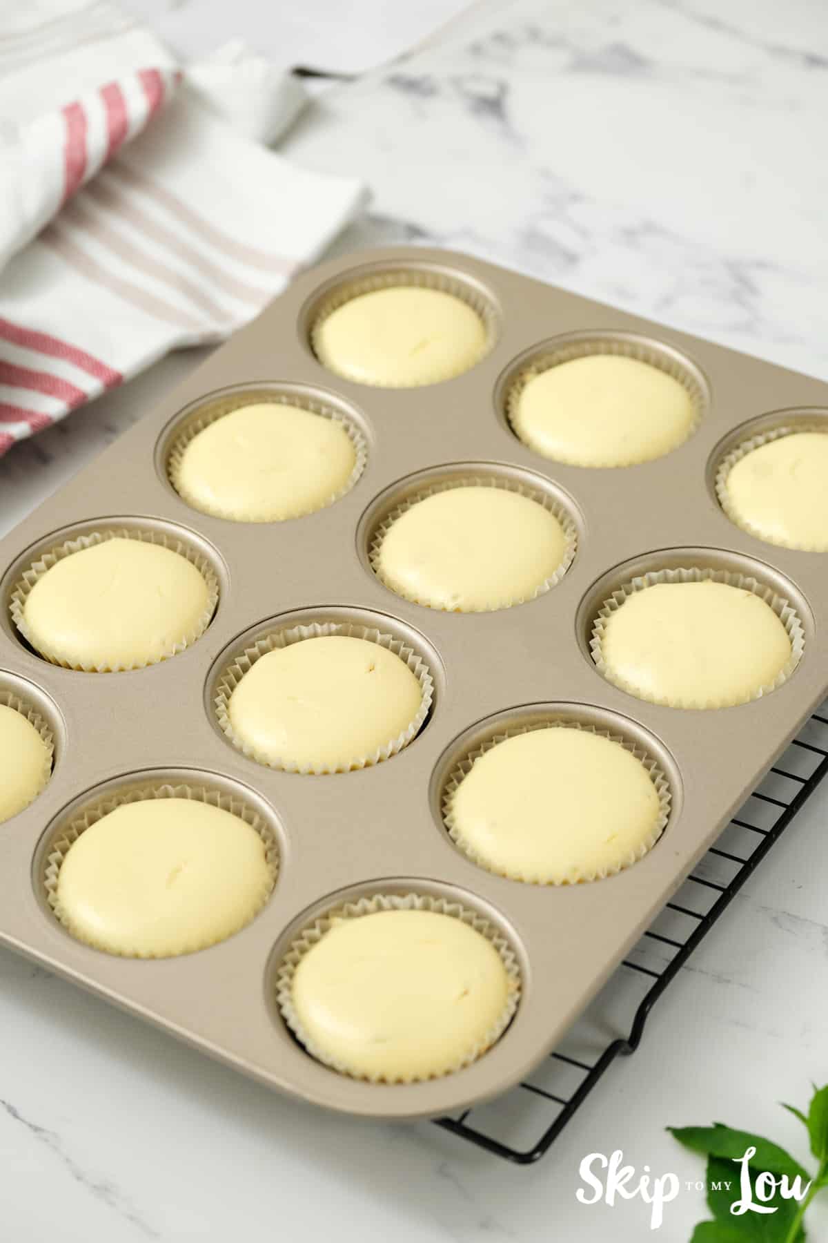 pour batter over the cooked chocolate chip cookies