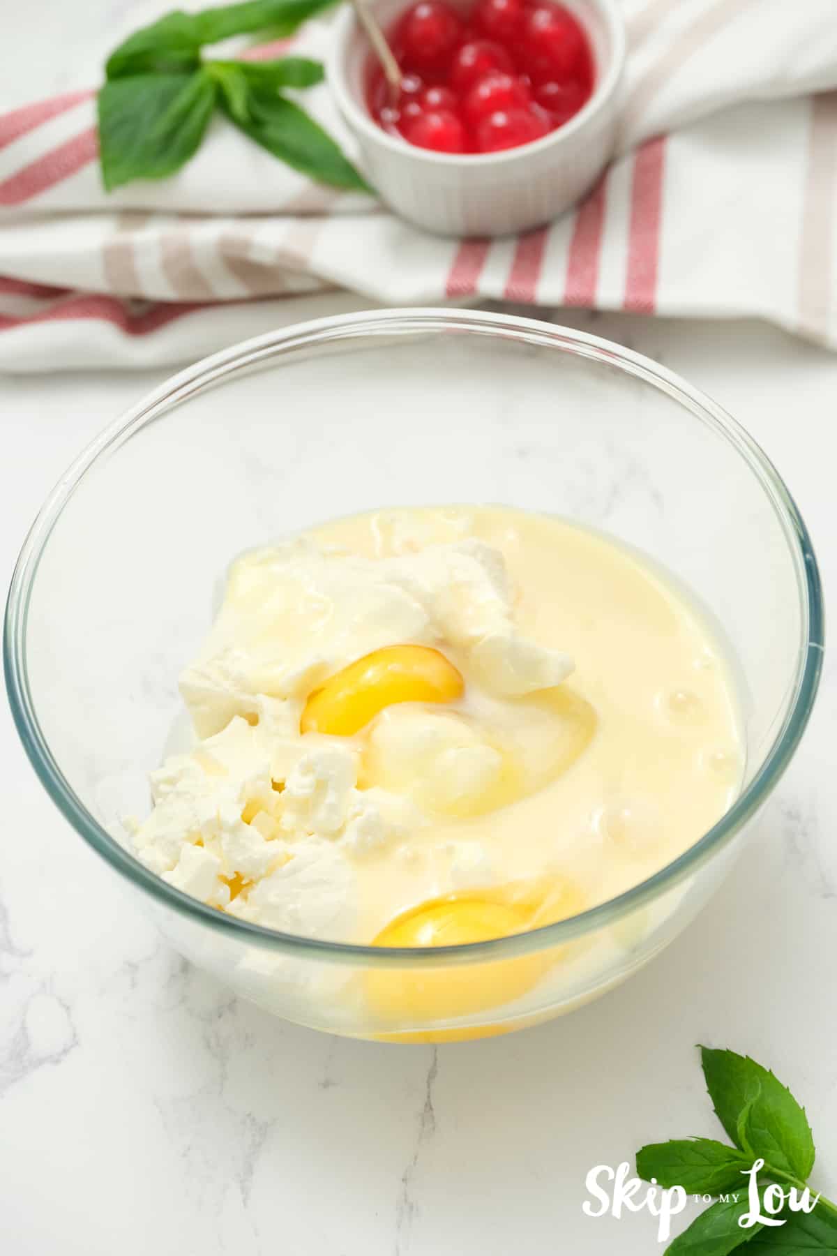 add eggs to the mix for the chocolate chip cookie cheese cakes