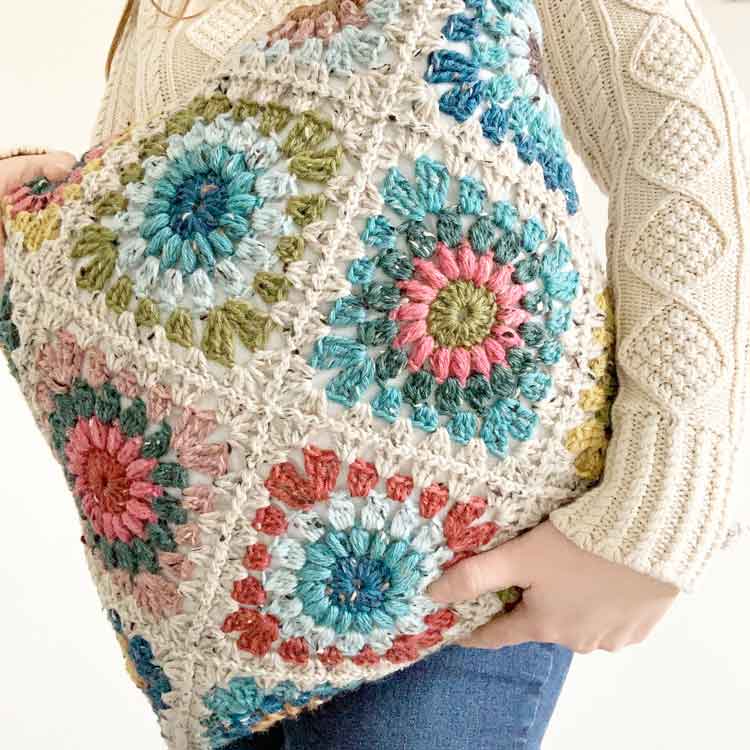 stunning granny square pillow