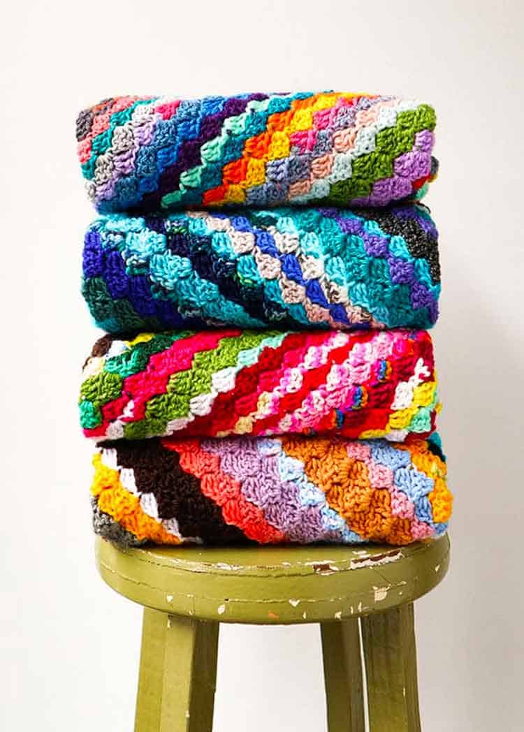 colorful scrappy crochet blankets to give as gifts