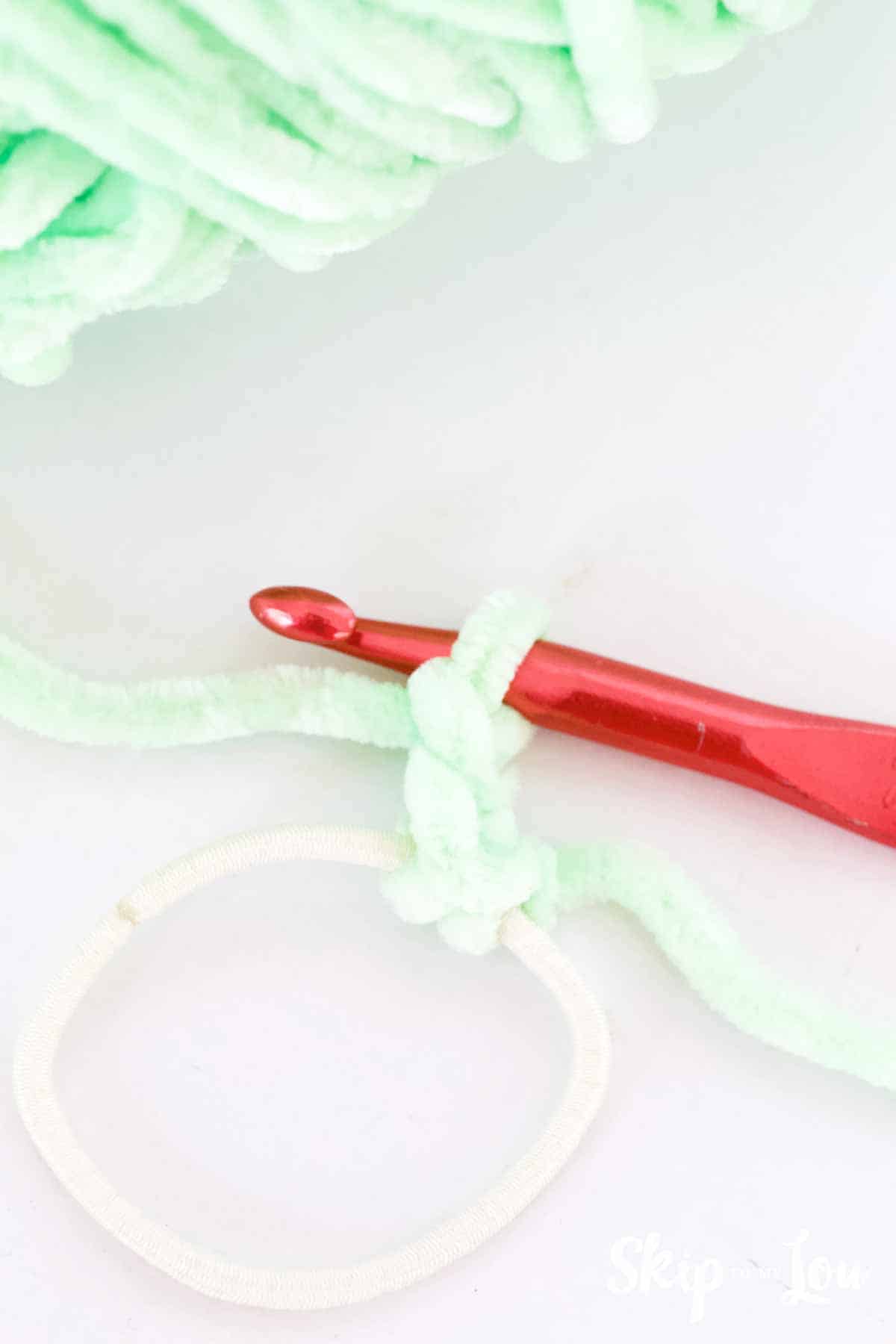 slip stitch around elastic hairband for crochet scrunchie