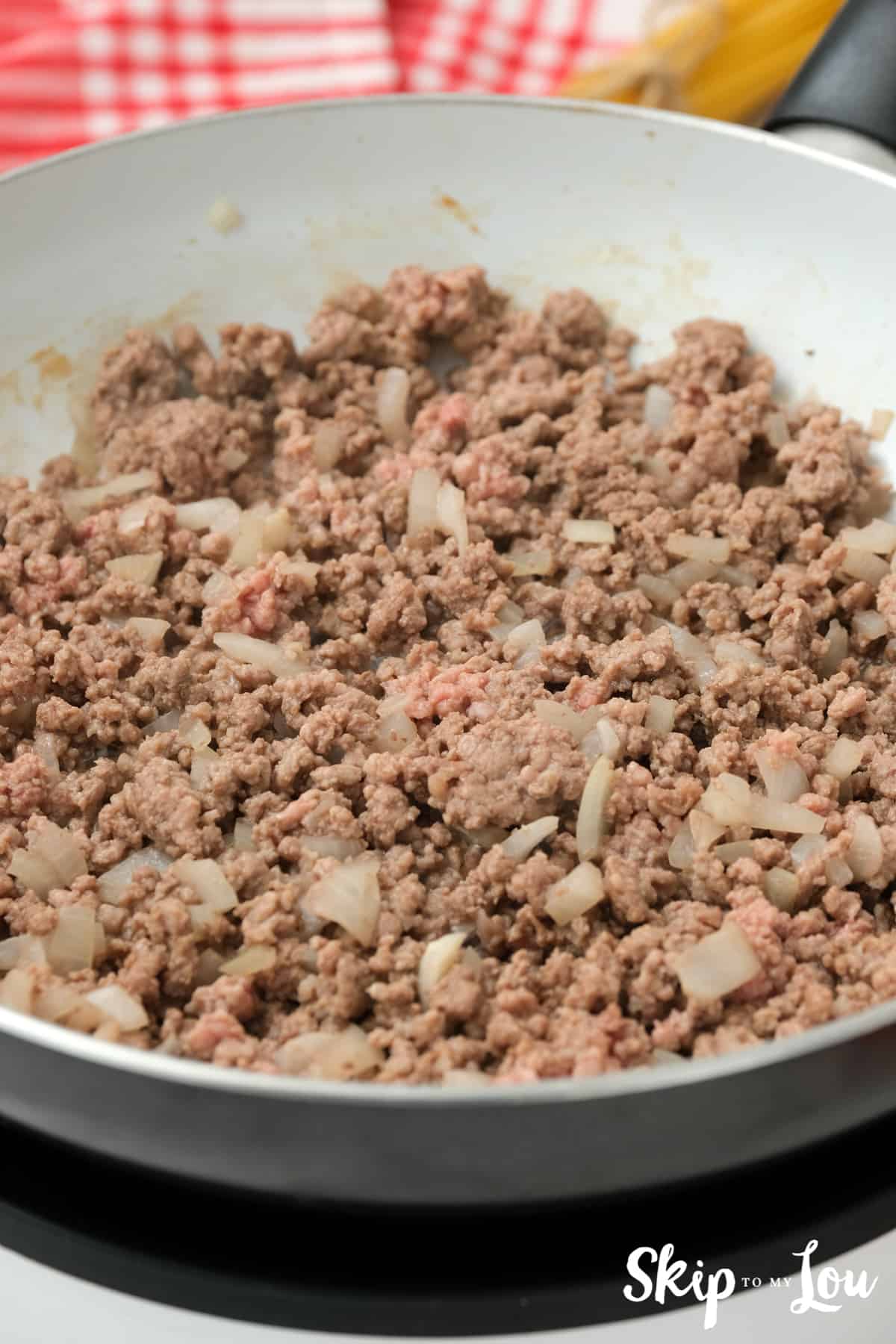 Ground beef and onions cooking for the Mexican Spaghetti.