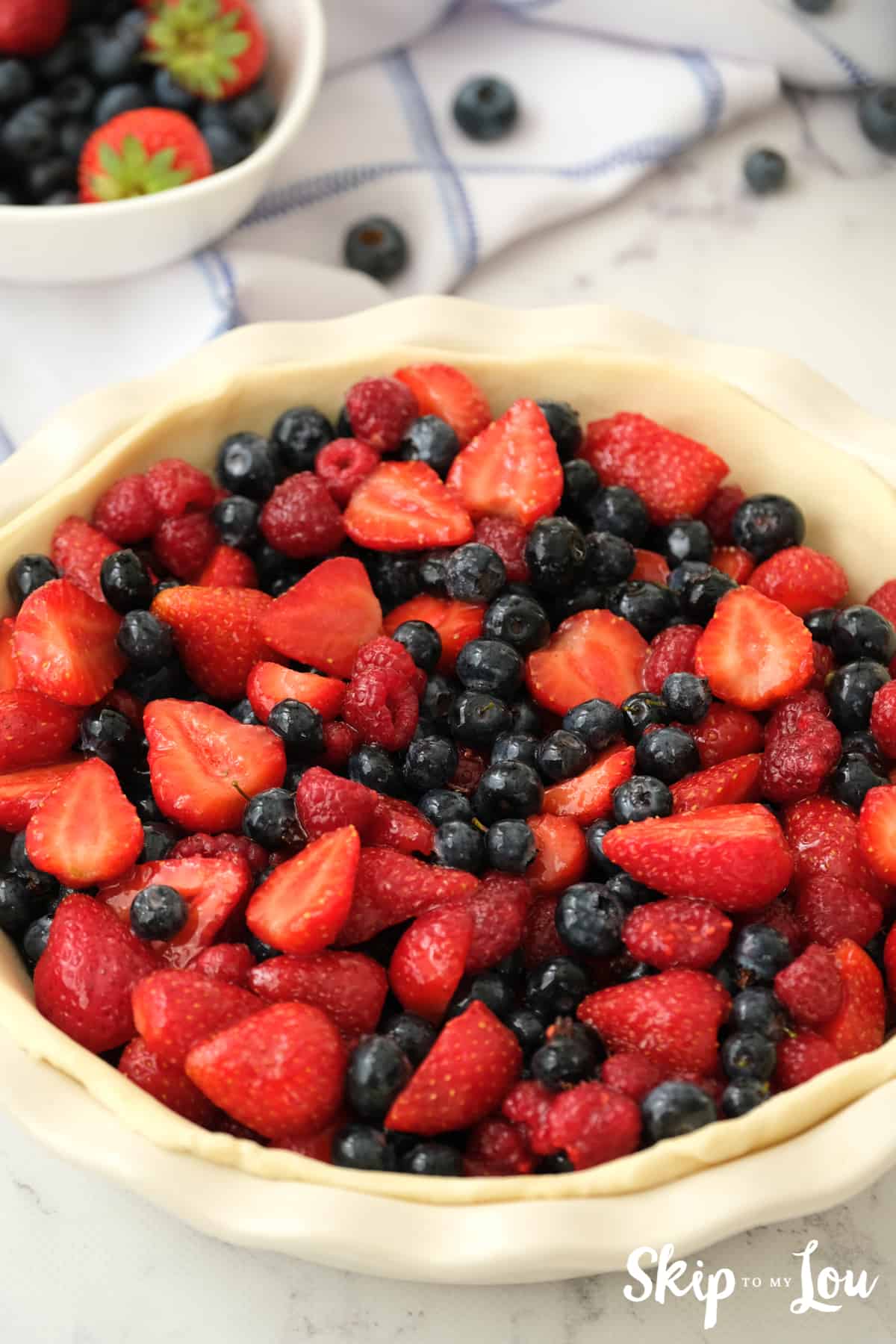 All berries in pie crust for Triple Berry Pie.