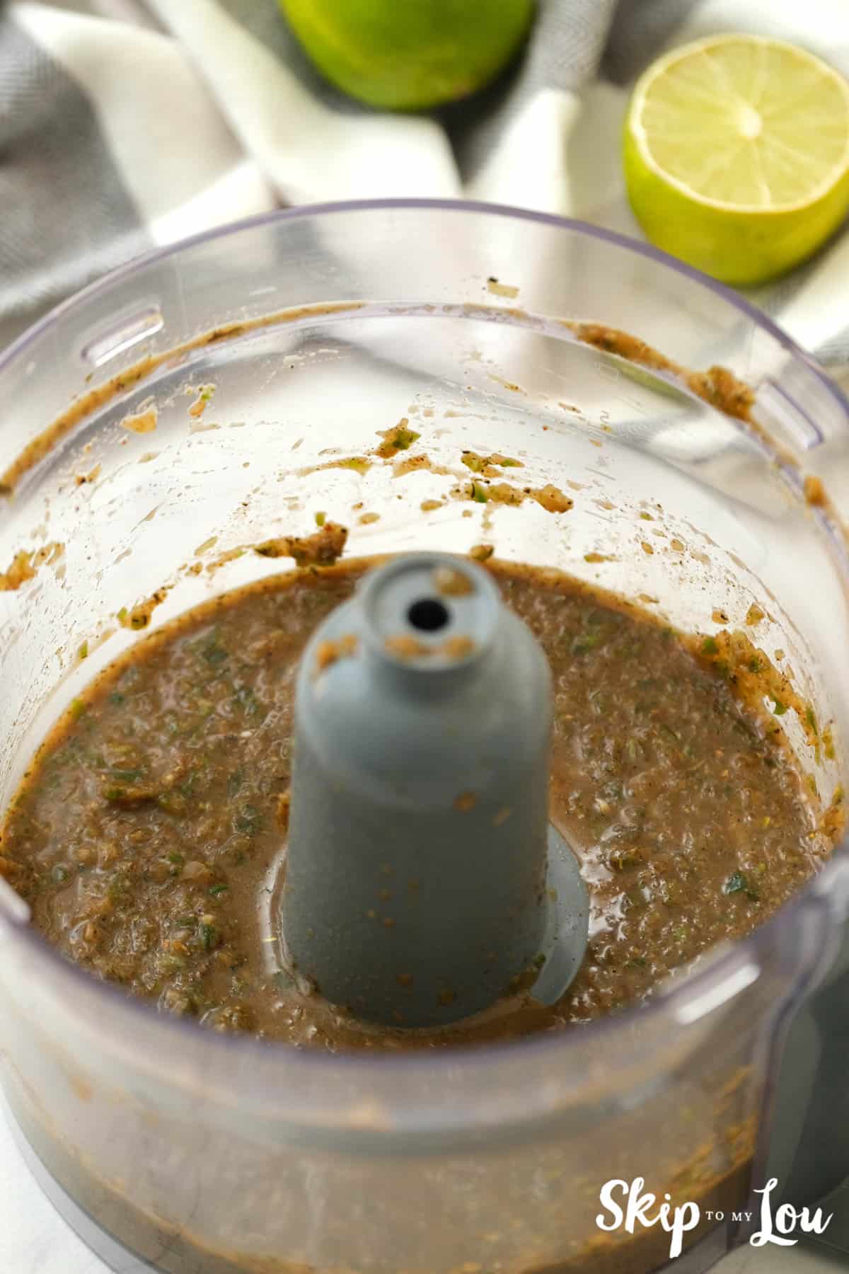 Jerk Chicken Recipe ingredients that have been pureed in a food processor. -Skip To My Lou