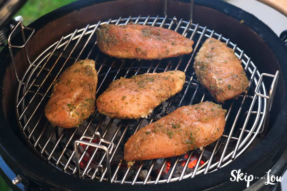 Jerk Chicken removed from marinade and placed on a warm grill. -Skip To My Lou 