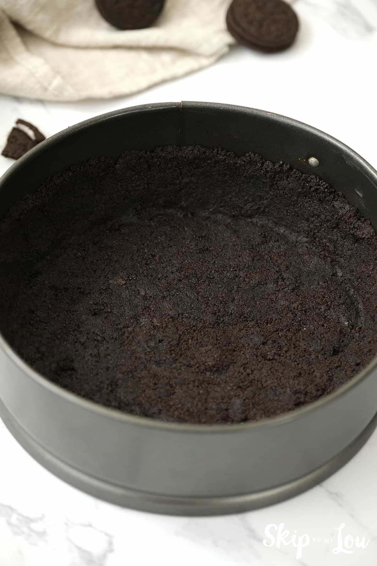 Oreo cookie crumbs pressed into the pan and up on the sides for the Oreo Pie