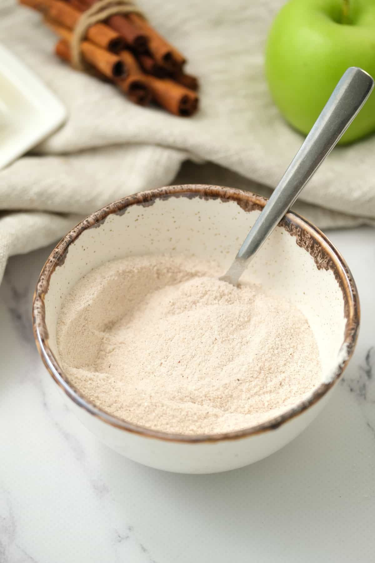 Dry Ingredients for Rustic Apple Pie filling mixed in a small bowl.