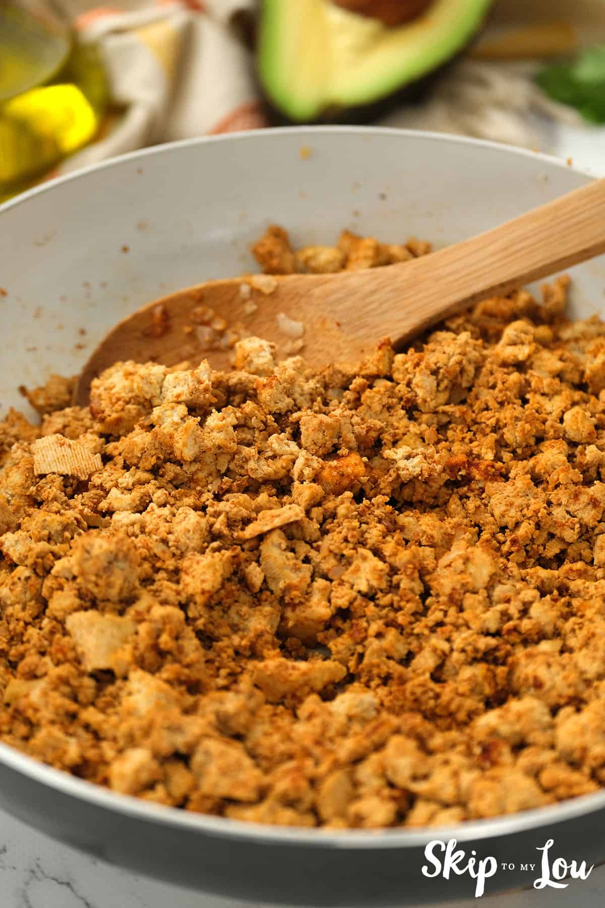 Continuing to cook the tofu mixture in a large pan for the sofritas bowl.