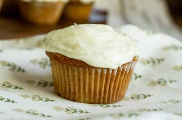 Image shows a carrot muffin made with sourdough.
