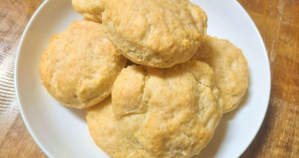 Image shows baked biscuits made with sourdough.