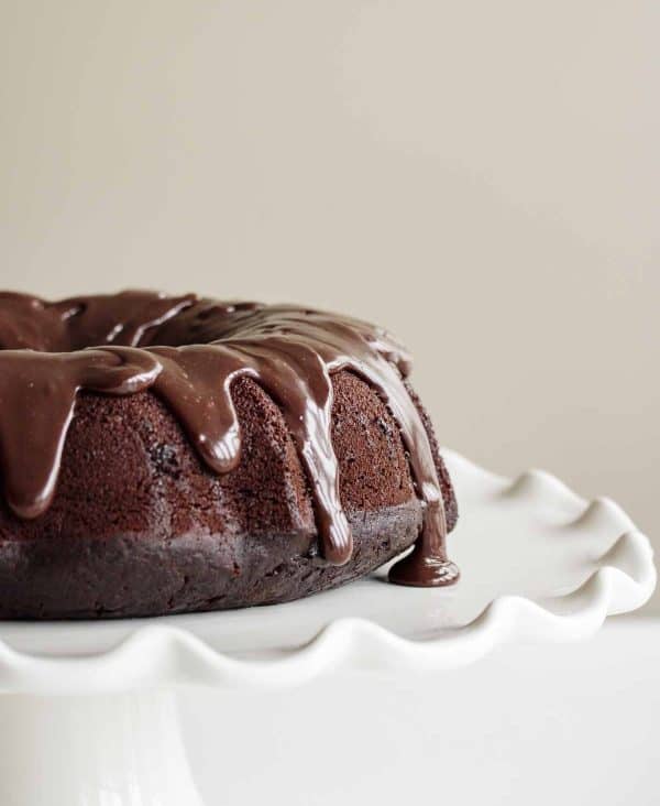 Image shows a sourdough chocolate cake on top of a plate.