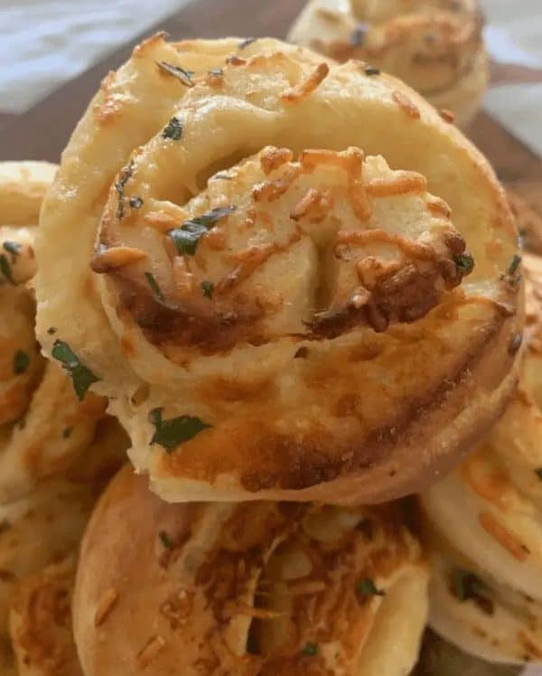 Image shows a sourdough garlic bread.