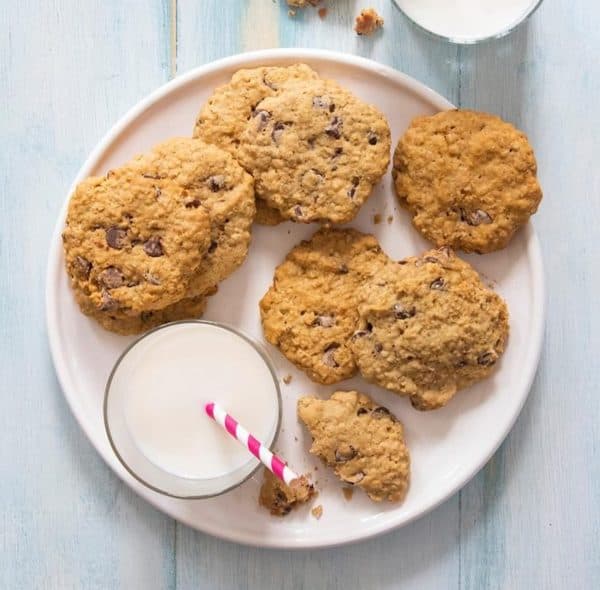 Image shows a plate with sourdough oatmeal chocolate chip cookies