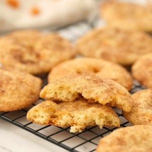 Toffee Doodle Cookies displayed on a wire rack. -Skip To My Lou