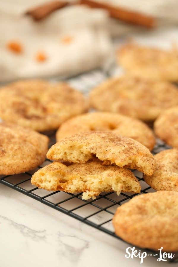 Toffee Doodle Cookies displayed on a wire rack. -Skip To My Lou
