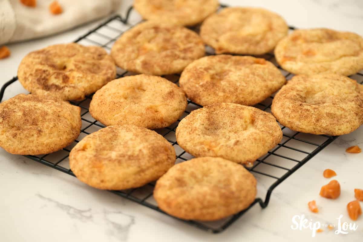 Toffee Doodle Cookies cooling on a wire rack. -Skip To My Lou