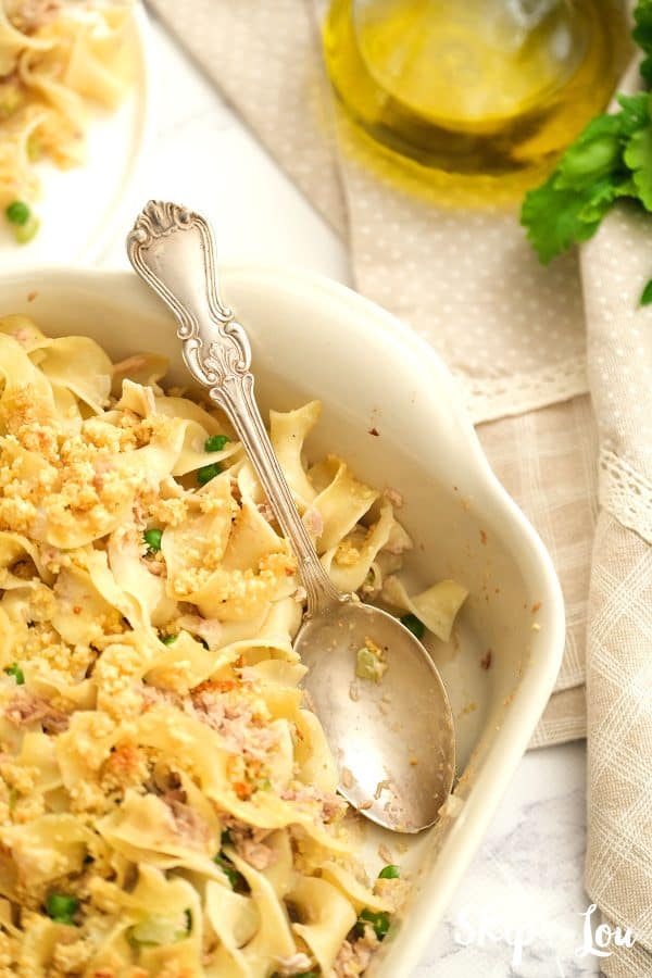 Dish of Tuna Noodle Casserole with serving spoon.