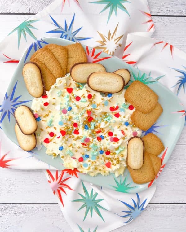 Image shows a sprinkles buttercream board.