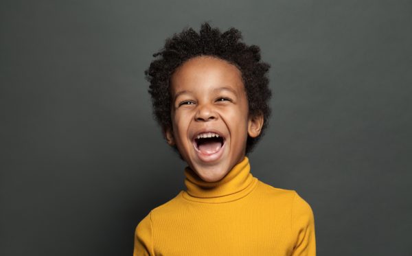 skip to my lou image of boy laughing at kids jokes