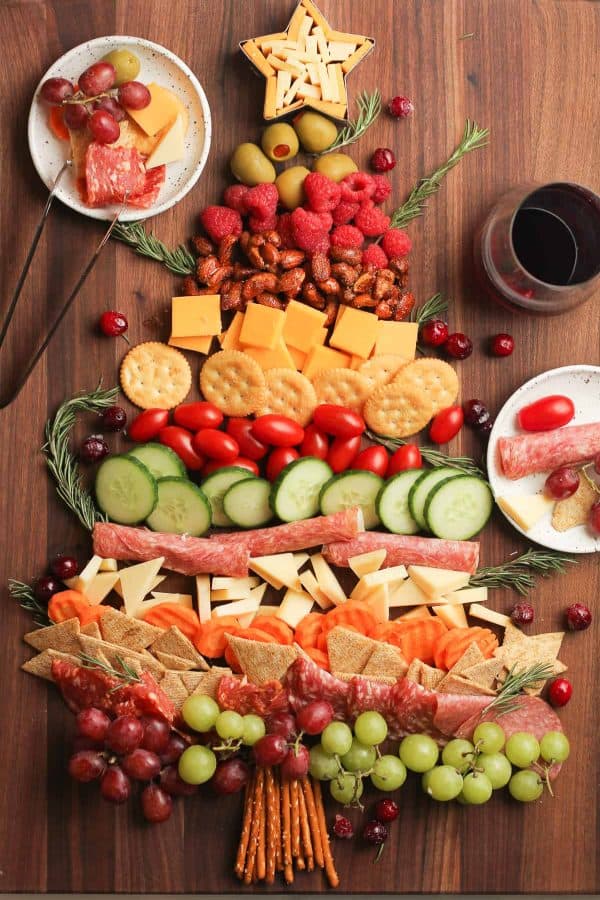 Image shows a fruits, vegetables, meats and cheese board shaped like a Christmas tree. via suebee homemaker