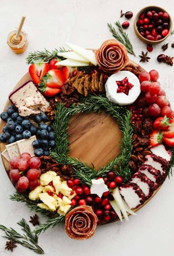Image shows a charcuterie board shaped like wreath. from the recipe critic