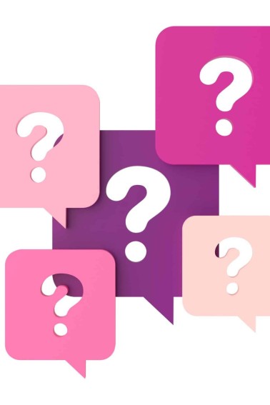 various pink talk bubbles with white question marks