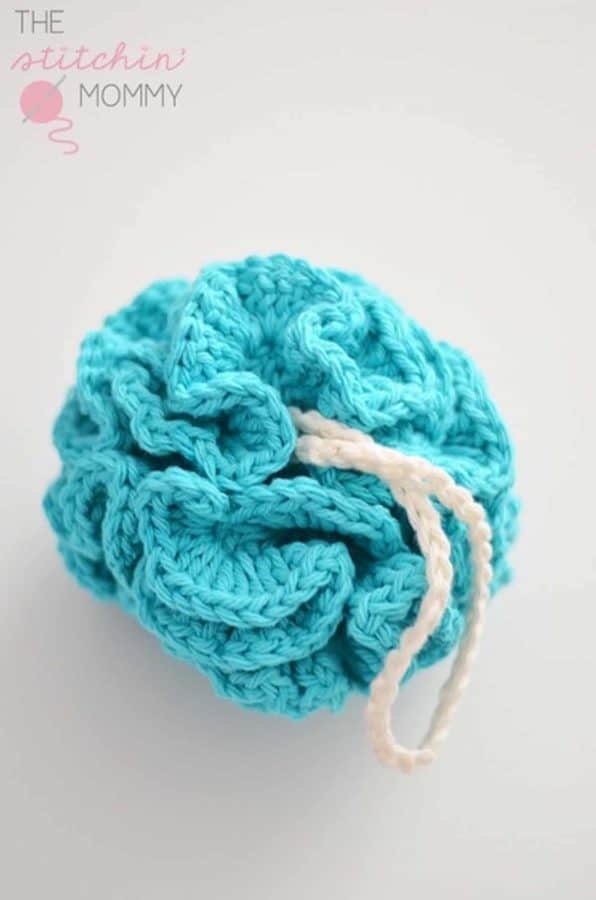 blue bath puff on white background
