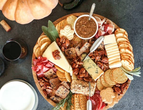 Image shows a nut-based thanksgiving charcuterie board.
