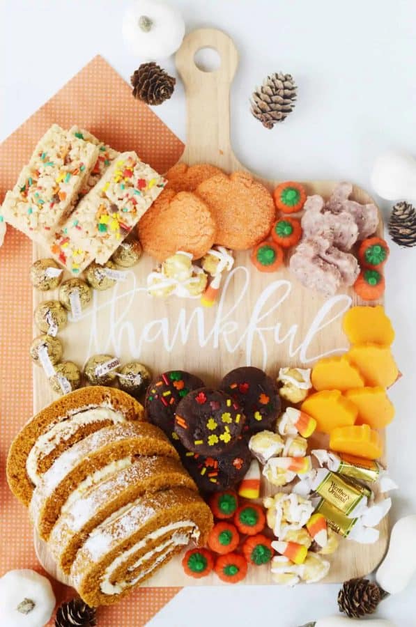 Image shows a dessert board with a Thanksgiving theme.