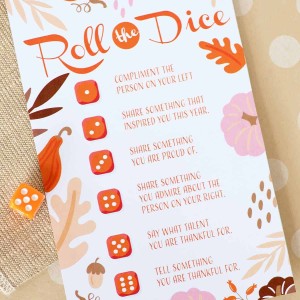 roll the dice printable on a table with dice