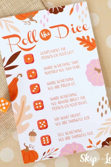 roll the dice printable on a table with dice