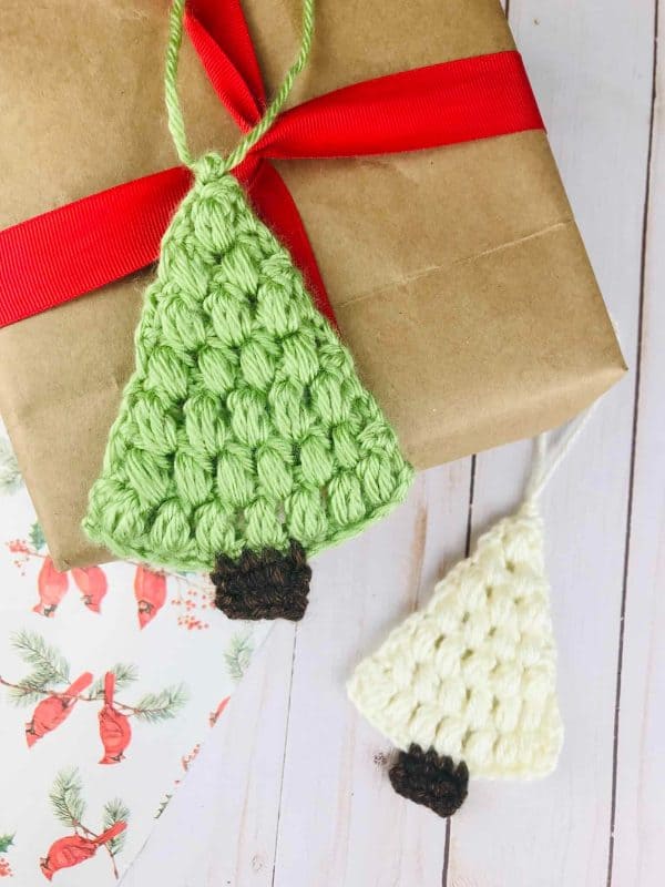 crochet Christmas tree ornament on brown package skip to my lou