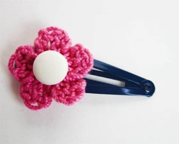 pink flower hair clip on a white background