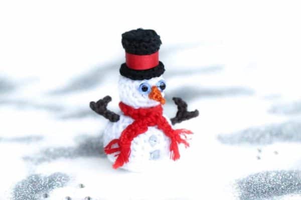 snowman ornament with red scarf  skip to my lou