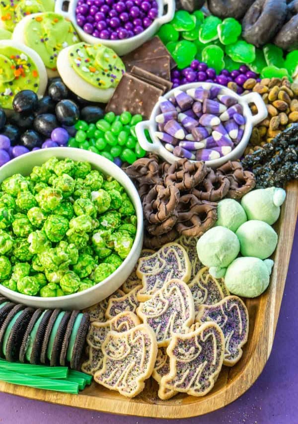 Image shows a dessert board with a halloween theme. via play party plan
