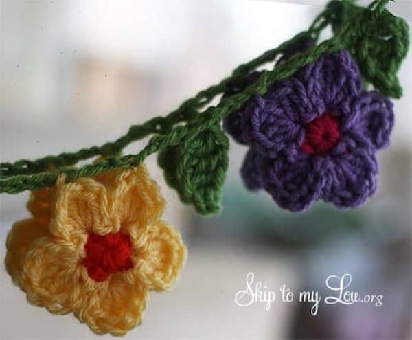 crochet flower garland by window skip to my lou