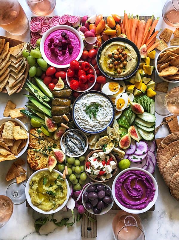 Image shows a Mediterranean hummus board.