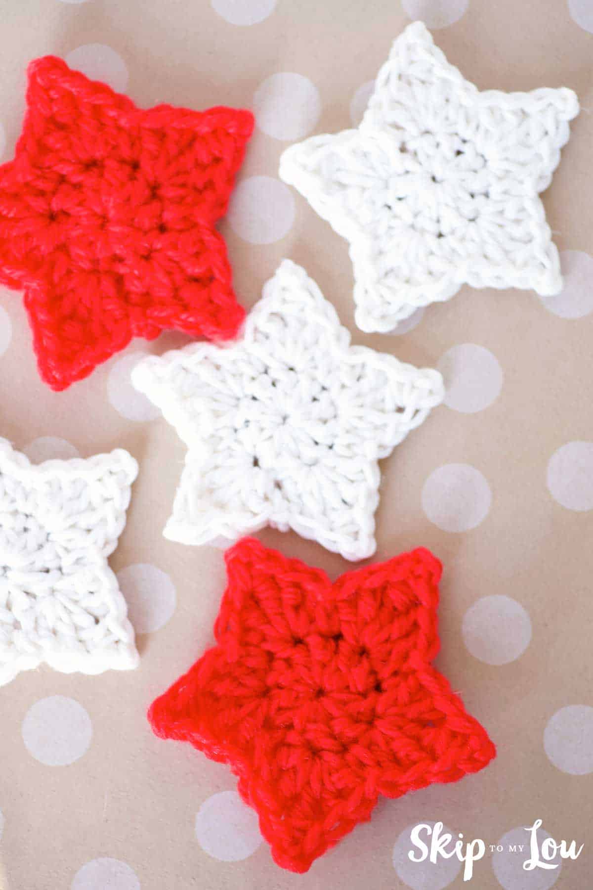 Image shows finished crochet stars in red and white - Skip To My Lou
