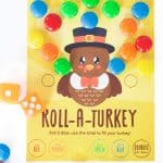 roll a turkey game card from skip to my lou with dice and m&m's