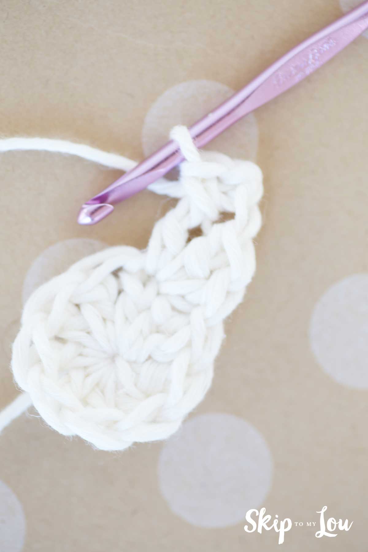 single crochet in top of treble