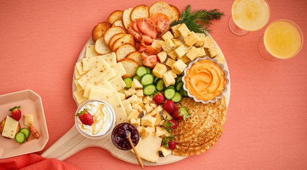 whipped cheese board recipes-wisconsin cheese- a simple cheese board with a variety of cheese, and a cheese dip.