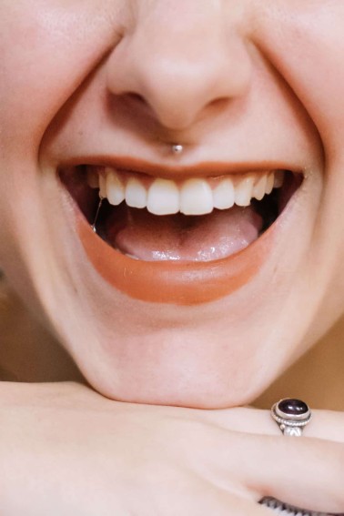 closeup of woman's mouth laughing