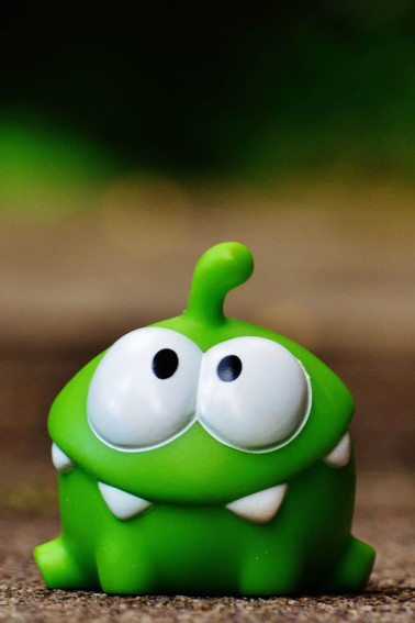 silly green omnom toy
