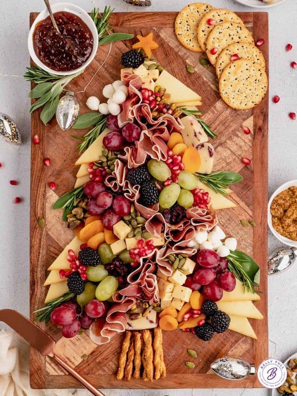 christmas tree charcuterie board ideas- wild christmas tree with meats, cheese, and more 