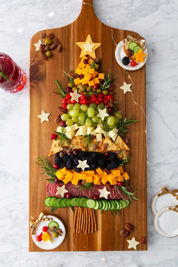 Christmas tree charcuterie board ideas- simple board with the necessities, fruit, and meat. 