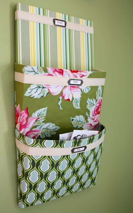 Mail organizer hanging from a wall.