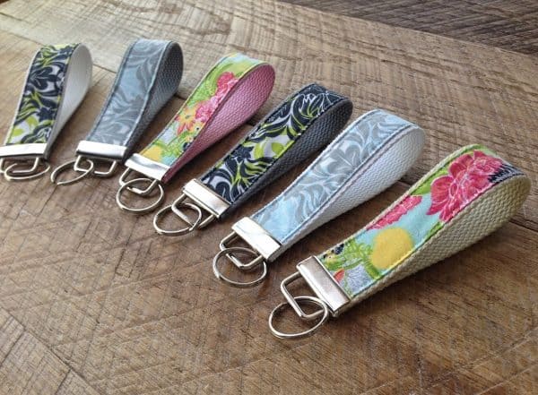 Fabric key chains in different styles next to each other.