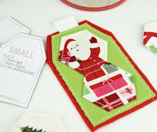 Image shows gift cards with hexies, they have a Santa on them.